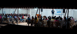 Together is Better: Participants on day one of the conference during Opening remarks and prayer session